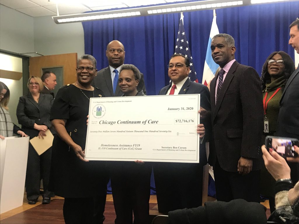 Pictured: Carolyn Ross, Mayor Lori Lightfoot, and HUD Representative Joe Galvan.